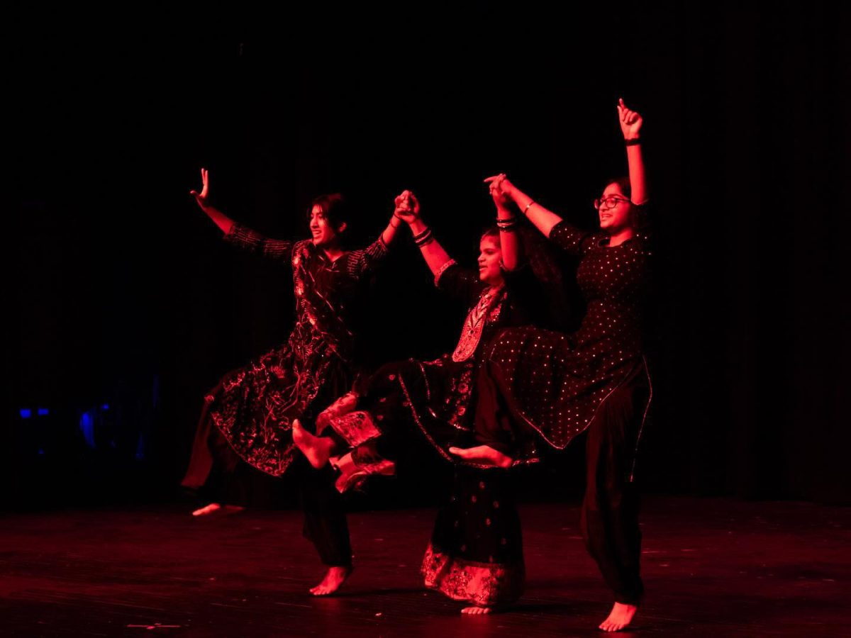 Falisa Aujla (11), Ashima Bawa (9), Dasnoor Kaur (10) dancing at Multicultural Night
