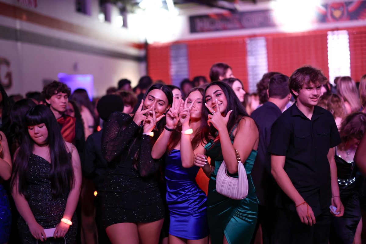 A snapshot of a group of friends during the homecoming dance